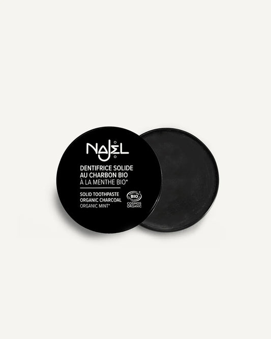 Solid toothpaste with organic charcoal